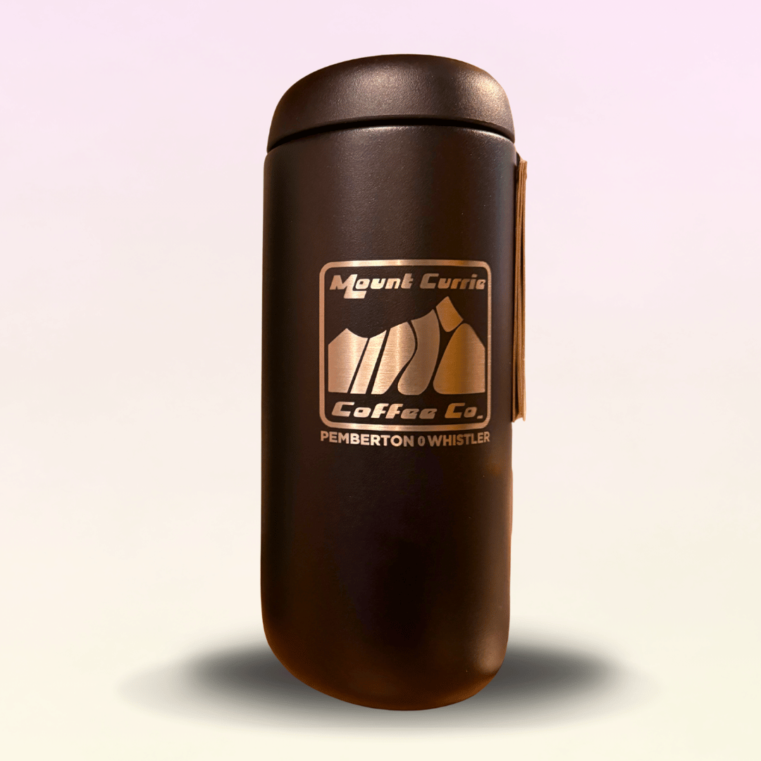 Wide-mouth insulated travel mug with MCCC logo and Pemberton Whistler laser etching, available in mint chip, warm pink, and matte black