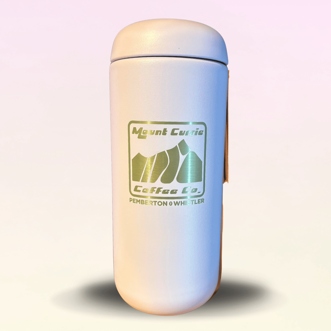 Wide-mouth insulated travel mug with MCCC logo and Pemberton Whistler laser etching, available in mint chip, warm pink, and matte black