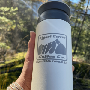 Large insulated travel tumbler with MCCC logo and Pemberton Whistler laser etching, available in white and ash green